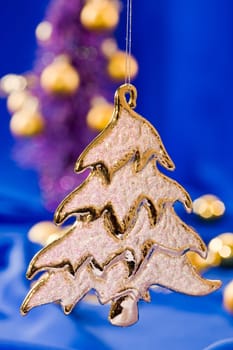 holiday series: golden Christmas fir with rich decorated  background
