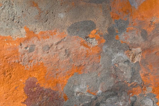 Old grunge texture background, concrete grungy wall painted with different colors, copy space