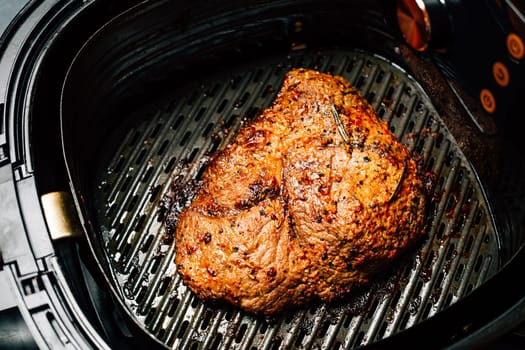 Grilled flank beef steak with rosemary, prepared in airfryer