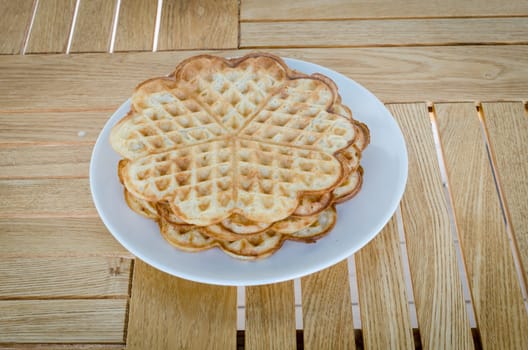 one plate with a couple of waffles