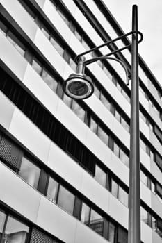 Office building in the city centre of Berlin with street lamp