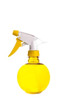 A yellow plastic spray bottle with a round, bowl shaped body and a white and yellow nossle head, situated on an isolated white background.