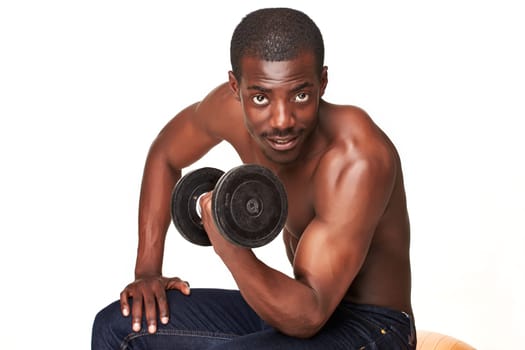Strong and muscular handsome young black african man with dumbbell isolated on white background