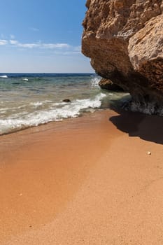 Panorama of the beach at reef, Sharm el Sheikh, Egypt. beach and cliffs overhanging the water