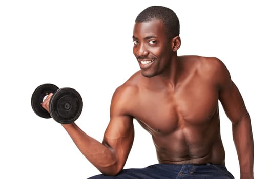 Strong and muscular smiling young black african man with dumbbell isolated on white background