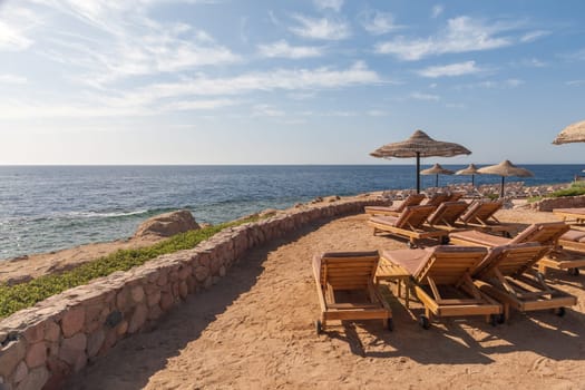 The beach at the luxury hotel, Sharm el Sheikh, Egypt. chairs and umbrellas
