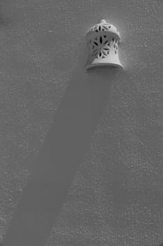 The decorative light on the white wall in Egypt