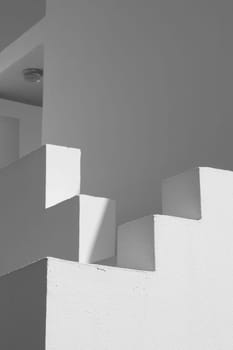 The small part of the white facade of the building in Egypt. side view