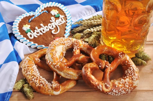 original Bavarian gingerbread heart with Oktoberfest beer mug and laugenbrezen