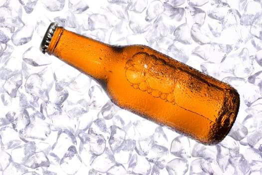 Fresh beer on background with cold ices.