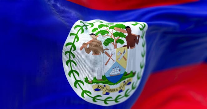 Close-up view of the Belize national flag waving in the wind. Belize is an independent state in Central America. Fabric textured background. Selective focus. Realistic 3d illustration
