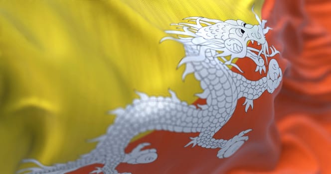 Close-up view of the Bhutan national flag waving in the wind. The Kingdom of Bhutan is a country in South Asia. Fabric textured background. Selective focus. Realistic 3d illustration