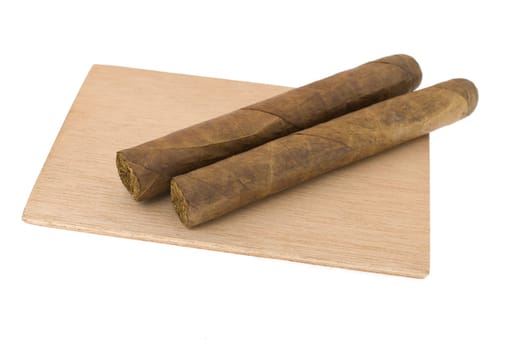 Two cigars isolated on white
