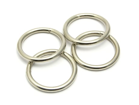 Four rings of metal arranged