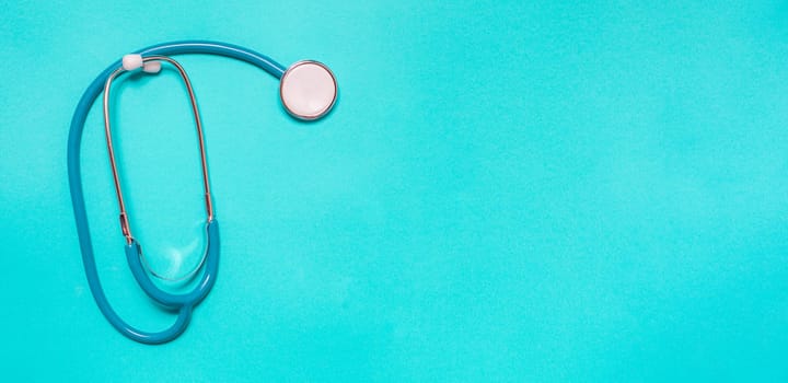 Medicine debate concept. Biotechnology banner with medical stethoscope and pills. Copy space for text. flatlay.