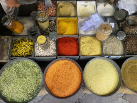 Spices and herbs background. Condiments on the table