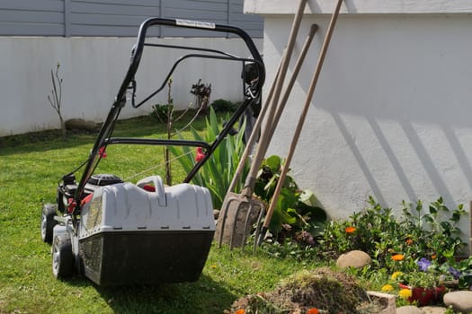 a lawn mower in the garden