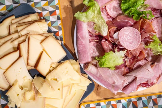 Raclette cheese and meat, a french tradition
