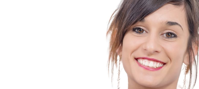 portrait of smiling young brunette on white