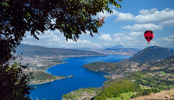 Panoramic view of the Lake Annecy from Col de la Forclaz with balloon