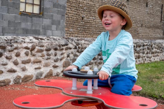 a young child playing in the park