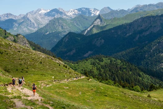 hikers  in path of Pic du Midi Ossau in the French Pyrenees mountains