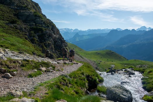 hikers  in path of Pic du Midi Ossau in the French Pyrenees mountains