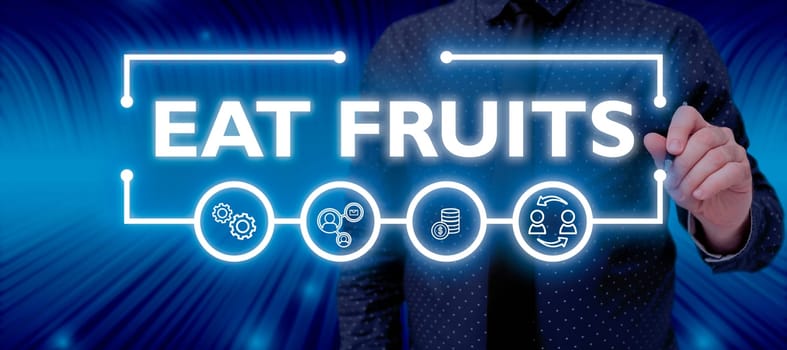 Text sign showing Eat Fruits, Word for consume any product of plant growth useful to humans or animals