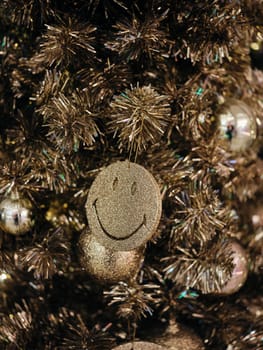 Christmas and Happy new year on christmas tree . Golden tone . SPACE FOR TEXT