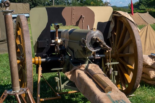 Old vintage gunpowder cannon on the wooden carriage