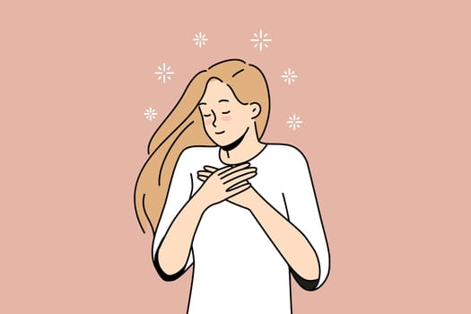 Happy woman with hands at chest feel grateful