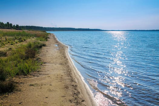 Grossraeschen Lake beach in Lusatian Lake District on a sunny day, Germany