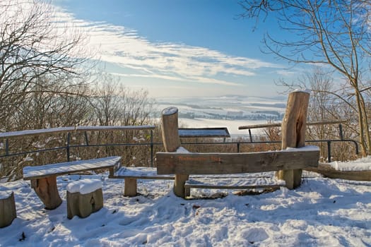in the town of Goerlitz, the mountain Landeskrone in winter, view to the south in Upper Lusatia