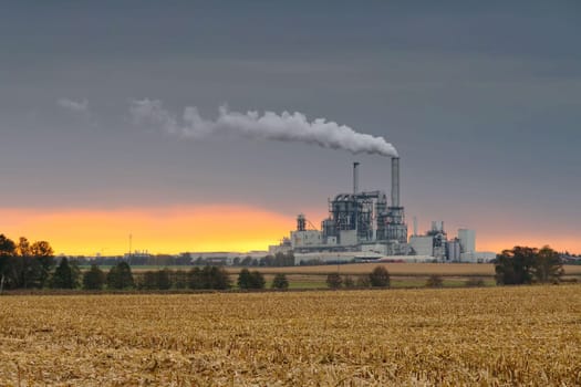 large industrial plant and smokestacks, major pollution