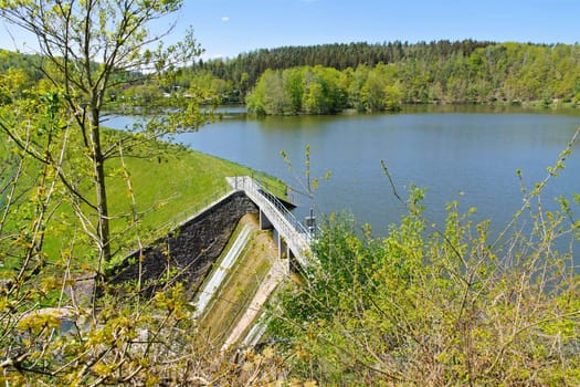 the Auma dam in the Vogtland with dam wall in spring, Germany