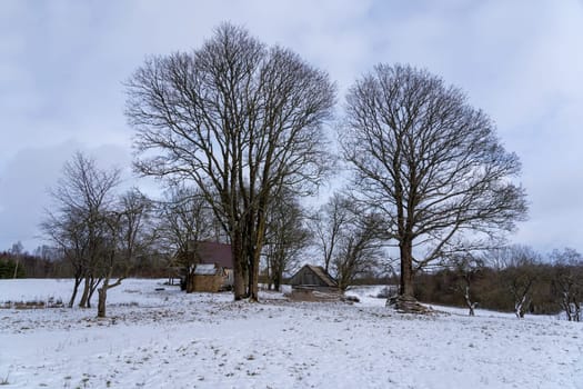 Abandoned village with wooden country houses from old times.