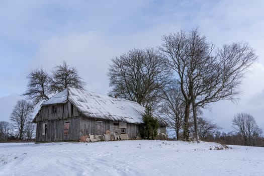 Abandoned village with wooden country houses from old times.