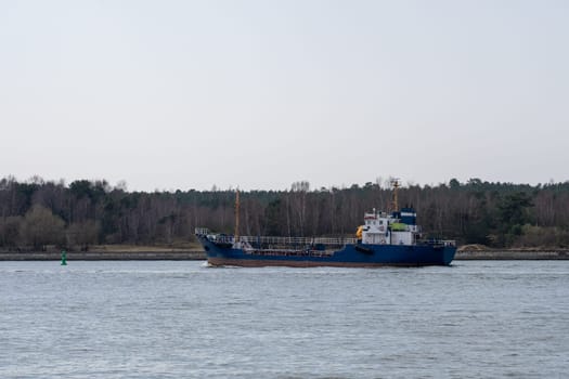 KLAIPĖDA, LITHUANIA - April, 2021 Blue ship in the Baltic Sea