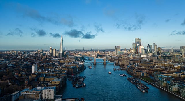 Typical aerial view over the city of London with Tower Bridge and River Thames - travel photography