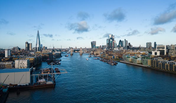 Aerial view over Tower Bridge and the city of London - LONDON, UNITED KINGDOM - DECEMBER 20, 2022