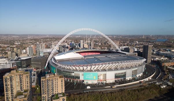 Aerial view over Wembley stadium in London on a sunny day - LONDON, UNITED KINGDOM - DECEMBER 20, 2022
