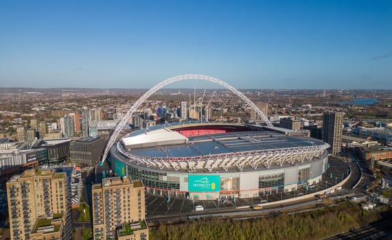 Aerial view over Wembley stadium in London on a sunny day - LONDON, UNITED KINGDOM - DECEMBER 20, 2022