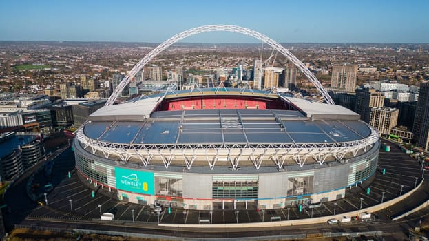 Aerial view over Wembley stadium in London on a sunny day - LONDON, UNITED KINGDOM - DECEMBER 20, 2022