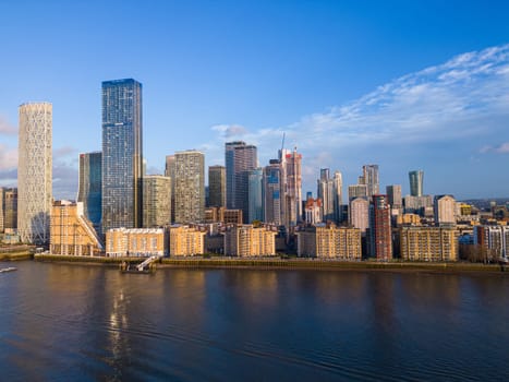 The skyscrapers of Canary Wharf in London on Isle of Dogs - panoramic view - LONDON, UNITED KINGDOM - DECEMBER 20, 2022