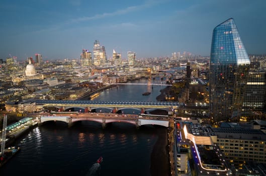 City of London in the evening - aerial view - LONDON, UNITED KINGDOM - DECEMBER 20, 2022