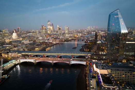 City of London in the evening - aerial view - LONDON, UNITED KINGDOM - DECEMBER 20, 2022