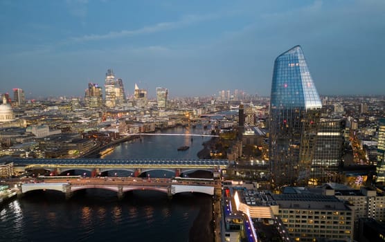 City of London in the evening - aerial view - LONDON, UNITED KINGDOM - DECEMBER 20, 2022
