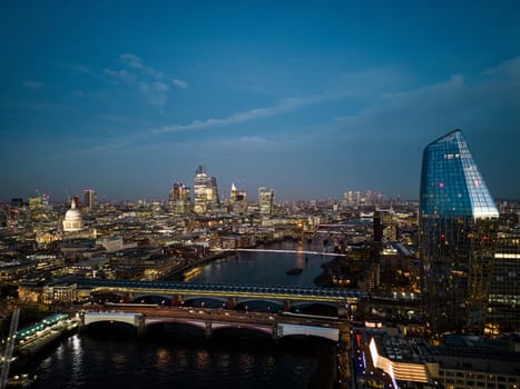 City of London in the evening - aerial view - LONDON, UNITED KINGDOM - DECEMBER 20, 2022