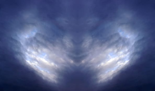 A lion or monkey face in the clouds