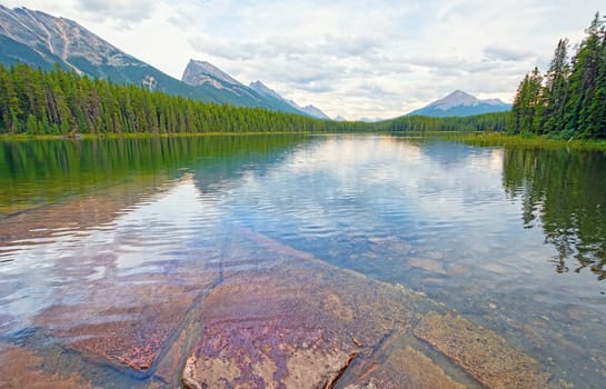 Calm Waters on an Alpine Lake on Honeymoon Lake in Jasper National Park in Alberta